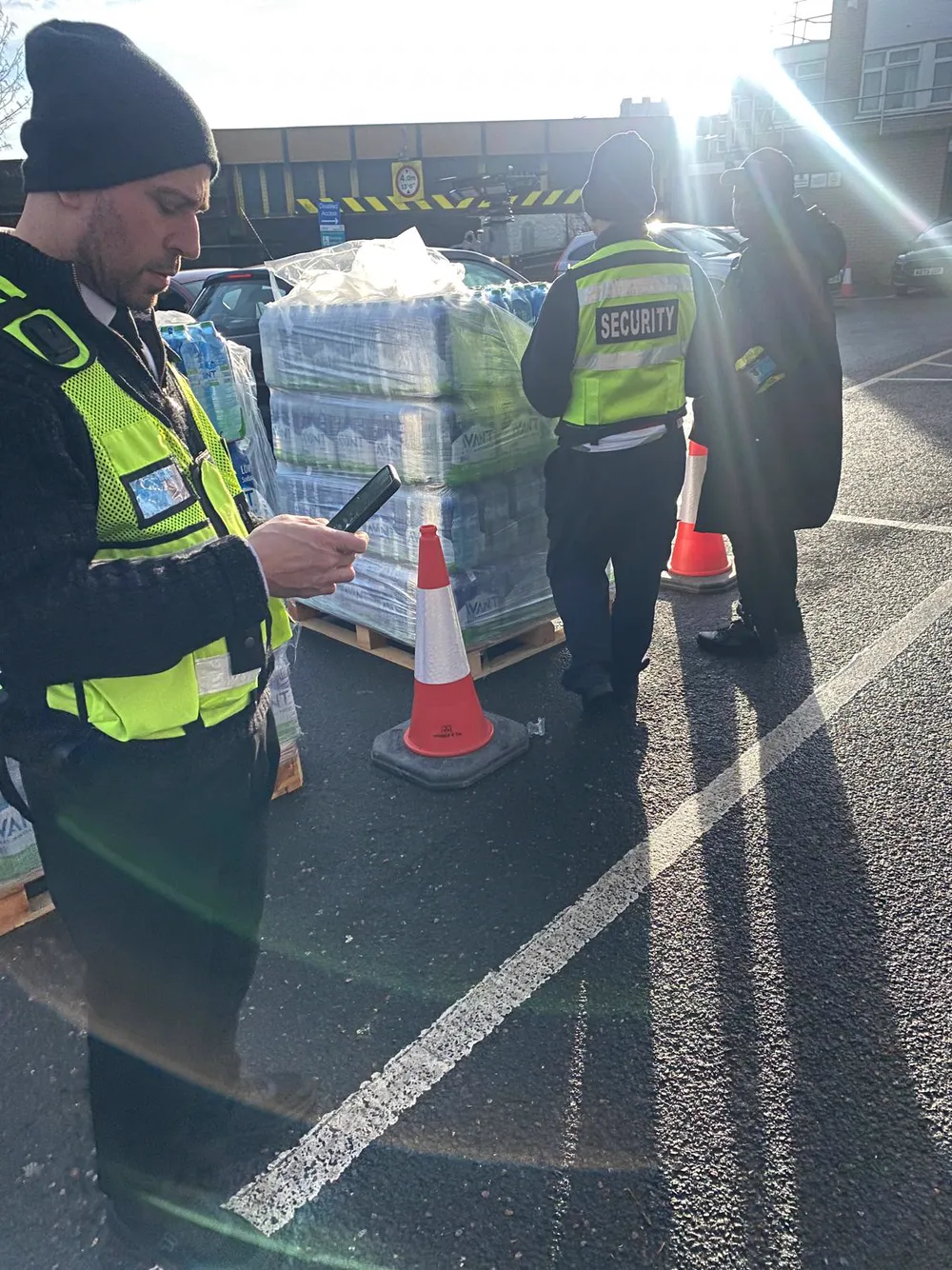 MavCo operatives handling water supplies on site